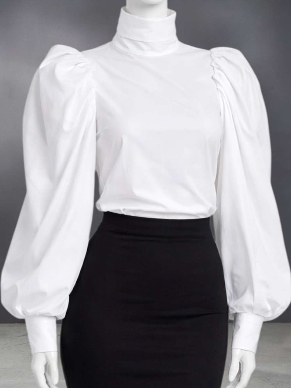 Swank A Posh “Jury’s Out Power Shoulder Top” Blouse